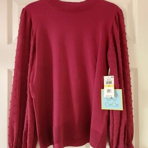 Deep Merlot Cece top with semi sheer sleeves.